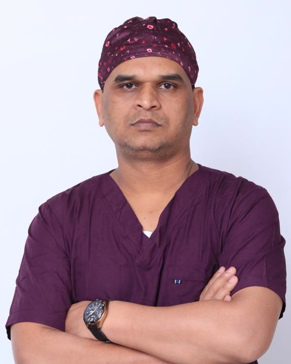 Dr. Ashok Date in theatre scrubs